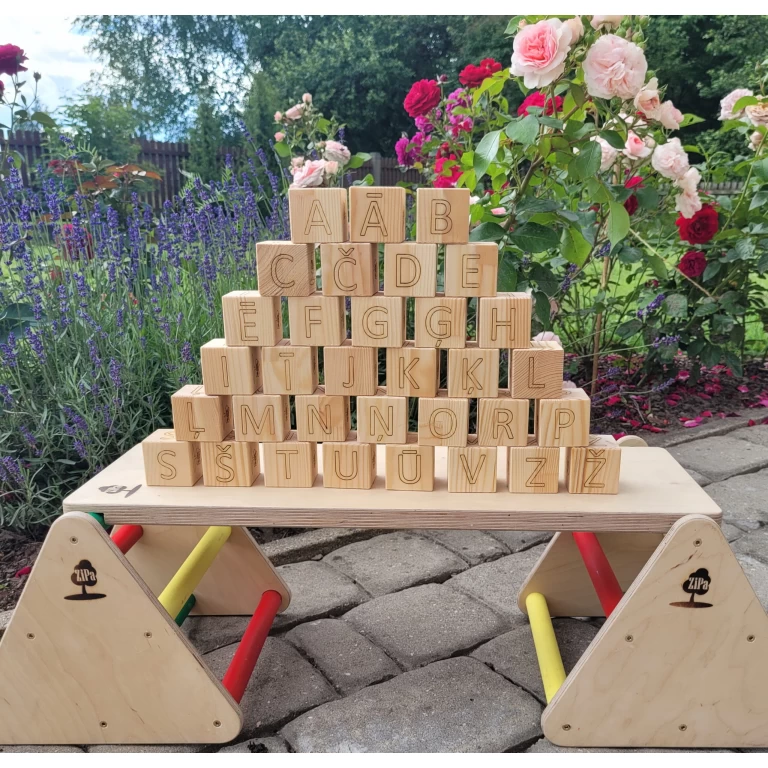 wooden alphabet blocks with Latvian letters