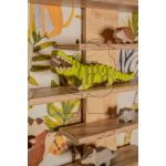 Toy shelf, close-up, with crocodile
