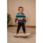 Baby on a balance board with variable inclination