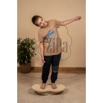 Child on a balance board with variable inclination