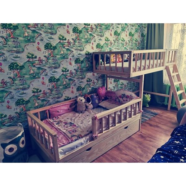 Offset bunk bed with play area